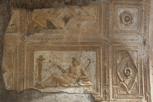 Stucco decoration in situ, Tetrapylon, Herculaneum. (Photo Credit: ISCR-Matera students)